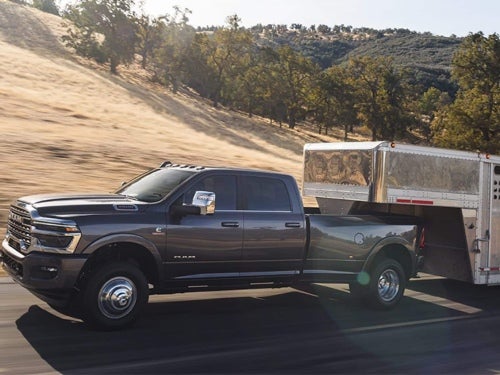 2025 RAM 3500 towing a trailer